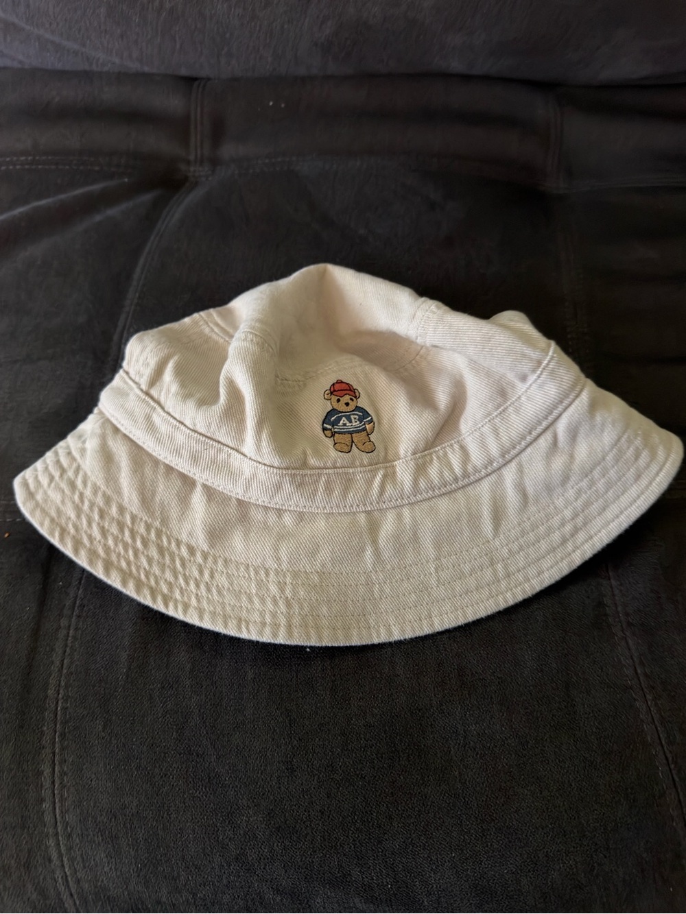American Eagle Outfitters Cream Bucket Hat with Teddy Embroidery